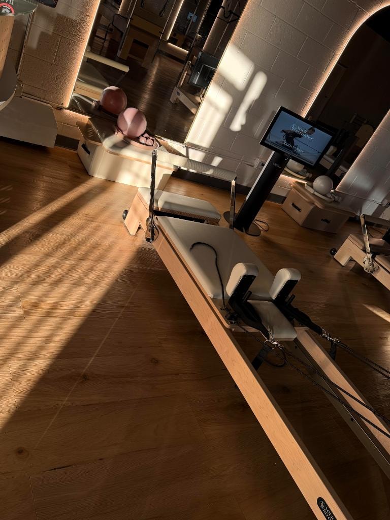 Luxury Pilates reformer equipment at PilatesLand